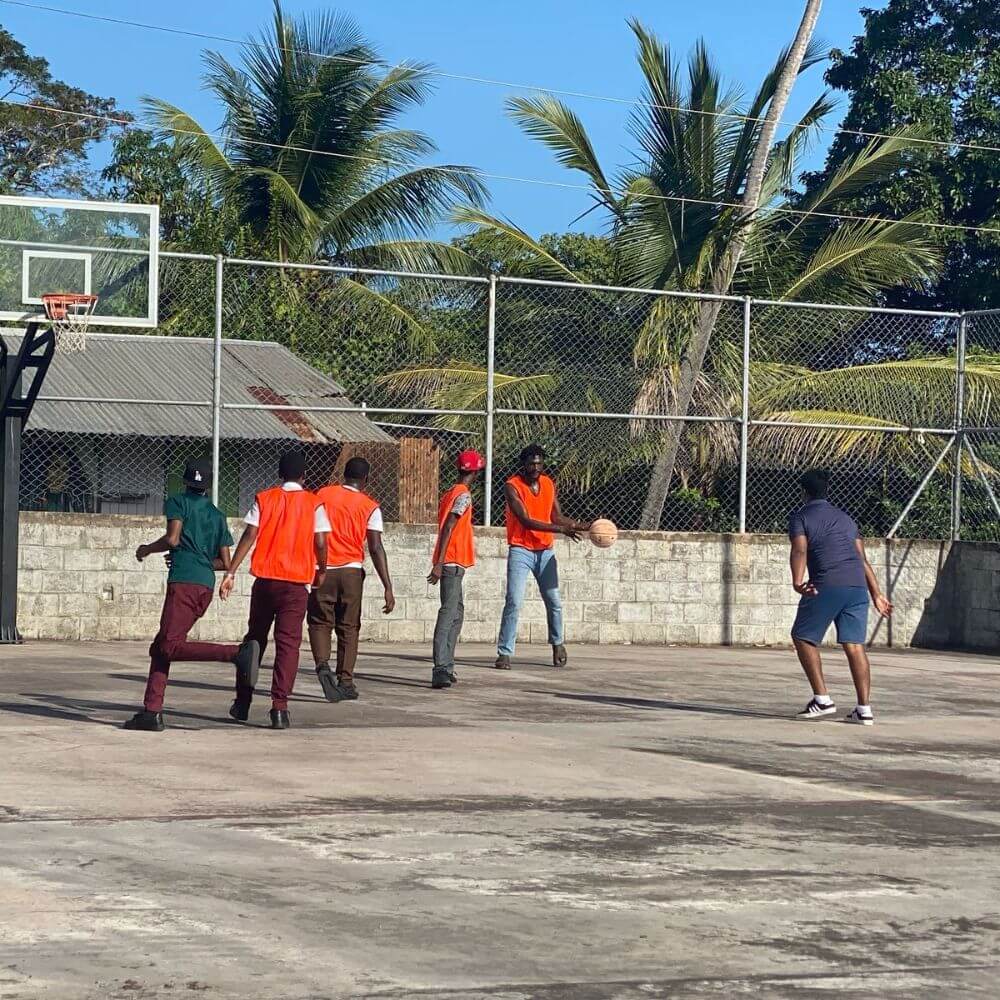 HYPE Mentors playing Basketball with our mentees